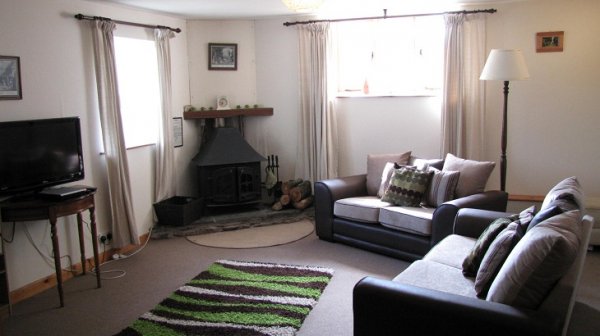 Worswell Barton B&B higher shippen lounge with wood burner.jpg